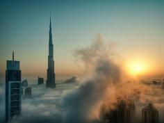 Skyscrapers in Dubai. How amazing would it be to have an office above the clouds...