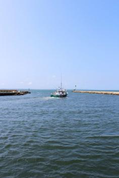 A boat floating in Cape Cod, Massachusetts