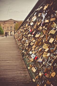 Love-Locks Bridge, Paris, France. Couples that have found the loves of their lives take a lock, lock it on the fence, and throw the key in the river.