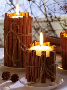 Tie cinnamon sticks around your candles. The heated cinnamon makes your house smell amazing.... #candles #autumn #centerpiece