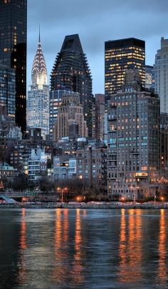 Manhattan Island as seen from Roosevelt Island across the East River in New York City • photo: JC Findley on FineArtAmerica