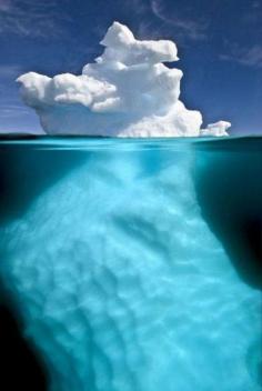 Split View Ice Berg, Pleneau Island, Antarctica - Photograph by Jonathan Green