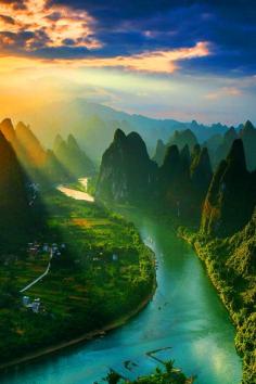 Watching the sunrise from the top of Mount Xiang Gong (Guilin of China). Sunrise by Tian Ma