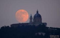 The SuperMoon rising alongside the Basilica of Superga, Turin, Italy on 6-22-13