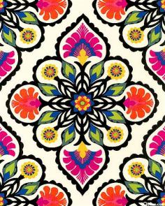 Colorful medallions formed from stylized flowers in a kaleidoscopic pattern