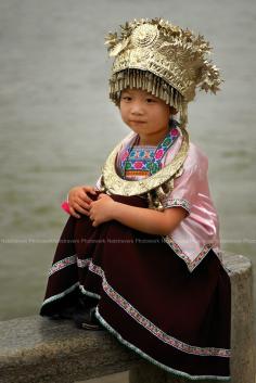 China | A young girl with traditional costume at Guilin | © Nathalie Stravers