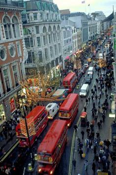 Oxford Street in London, England, at Christmastime.(Oxford Street is not anywhere near the city of Oxford -which is about 60 miles/90 km north west of London) - and is a major thoroughfare in the West End. Oxford Street is one of Europe’s busiest shopping streets, with approximately 300 shops. (gettyimages.com)
