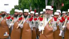 THE FRENCH FOREIGN LEGION IN THEIR FAMOUS LEATHER APRONS PREPARE FOR THE MILITARY PARADE OF THE 14 JUILLET.  It us à military parade, and tanks, missiles, guns, and sophisticated military equipment will be on display. Overhead, France's sophisticated fighter jets armed with missiles and helicopters will fly over.