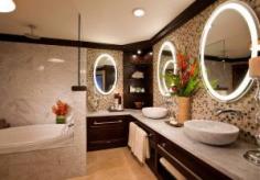 Gorgeous restroom with Custom double sink and mirror vanity with jacuzzi tub, and shower, and plenty storage during your stay.