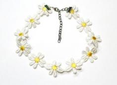 daisy chain: The quintessential motif of the 1990s had to be the flower—and you can still rock blossoms around your neck today. Daisy Choker on Etsy - See more at: vitamindaily.com/... choker