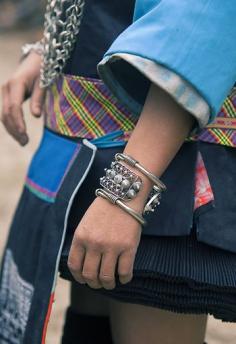 China | Details of a bracelet worn by a Short-Skirt Miao girl.  Guizhou | ©Agang's photoblog