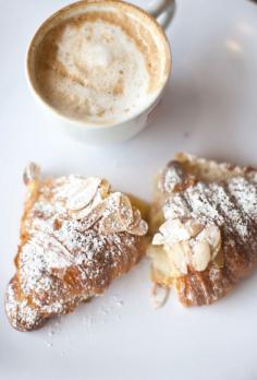 A Parisian breakfast of cafe au lait and croissant.
