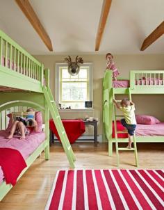 This bedroom features double-decker beds purchased on the cheap at an unpainted-furniture shop and transformed with custom paint.
