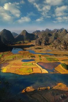 Paddy fields, Phuzehei, Yunnan , southern China by Weerapong Chaipuck
