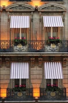 striped awnings — these particular ones are outside the hotel lancaster in paris. (february 2014)