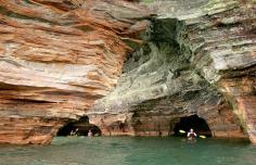 Kayak through the Apostle Islands, off the Wisconsin shore of Lake Superior. The group of 22 islands is riddled with caves, and during the winter visitors can see frozen waterfalls and icicle-filled chambers.