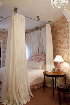 The Blantyre Mansion in the Berkshires perfects the elegant, feminine interior style in this guest room.