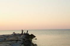 Go fishing at sunset in North Fork, Long Island.