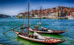 #TroveOn - Rabelo boats with the beautiful city of Porto on the background. The Rabelo boat is a tradition in Portugal. Native from the Douro region, it does not exist in any other place of the world. Its history is linked to the production and trade of port wine. Discovered by I'm Out of the Office at Oporto, Porto, Portugal