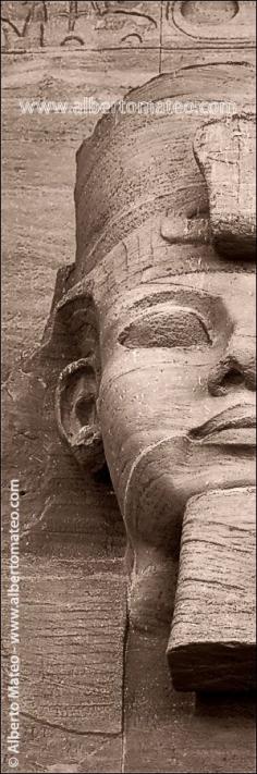 Ramses II face detail in the main facade of Abu Simbel Temple, Abu Simbel, Egypt - © Alberto Mateo, Travel Photographer