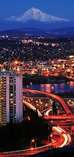 Mt. Hood, the Willamette river, and the freeway interchange viewed from the west hills of Portland, Oregon • photo: bnzai9