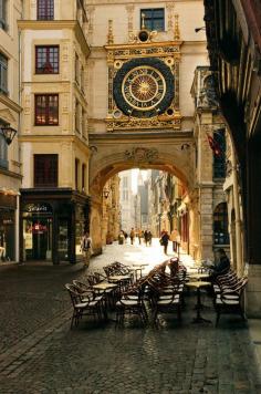 Bonjour Rouen, France.  Clocktower, cobble stone streets, outdoor cafes, stone buildings...  the old world--beautiful.