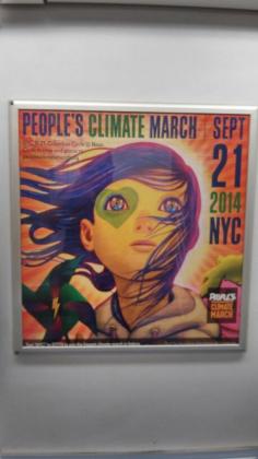 Climate March Poster on the 5 train