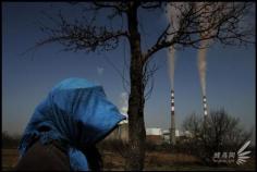 7. Shizuishan Industrial district in Ningxia province (宁夏石嘴山湖滨工业园区), the tall chimneys spitted out smoke and dust. Residents took preventive...