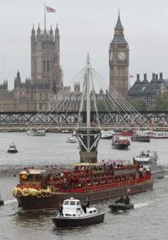 The Royal Barge as it sails up The River Thames - London