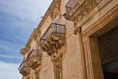 Lavish Baroque carvings on a palace in Noto, Sicily