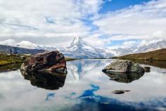 A cloudy Matterhorn reflected in Stellisee this morning. Discovered by Tom Page at Stellisee, Zermatt, #Switzerland