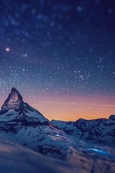 Starry Mountains over Mount Matterhorn, Swiss-Italian Alps.