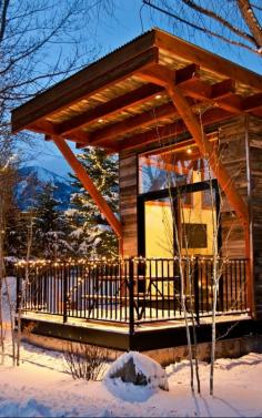 Cozy up in a Jackson Hole cabin. They feel rustic but have all of the modern amenities, including rain showers.