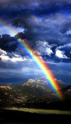 Rainbow over Rocky Mountain National Park, Colorado, USA