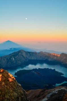 
                        
                            Mt Rinjani, Sembalun, Indonesia - This is the view from the summit of Mount Rinjani in Lombok, Indonesia. I did a 2 night and 3 day hike in this national park. On the second night we were woken at 2am to get ready and start trekking to the summit at 2:45am. We made it to the top (3,726 meters) an hour before sunrise. These three days were very challenging. They don't tell you how hard this hike is, but I'm so glad we made it to the summit because this view is unforgettable. I felt so accomplished!  Great memories, great people!
                        
                    