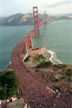 
                        
                            The 50th anniversary of the Golden Gate bridge in May 1986. They closed traffic and let people walk over it. There were so many people on the bridge that the middle span of the bridge flattened out.
                        
                    
