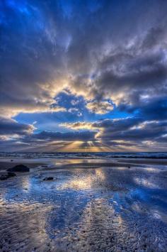 
                        
                            Stormy blue sunset in Morro Bay, California, United States.
                        
                    