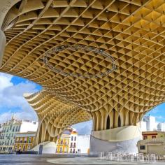 Seville's Metropol Parasol is known by locals as “Setas de la Encarnación,” or the Mushrooms of Incarnation. It’s home to an archaeological museum, a farmers’ market, and an elevated plaza with bars and restaurants. Photo courtesy of twins_that_travel on Instagram.