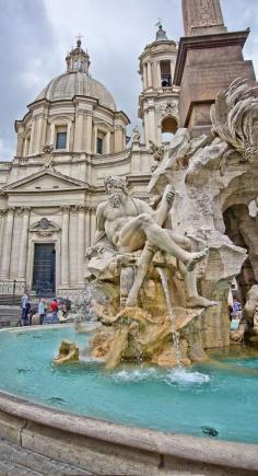 
                        
                            Fiumi Fountain, Rome, Italy - It seems that rain scared away all the other tourists. We strolled through the streets of Rome and randomly found this fountain.
                        
                    