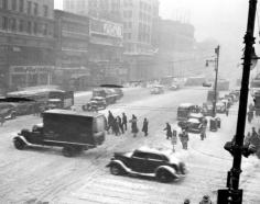 
                    
                        A blizzard turns Broad Street into a white blur during a cold winter day in 1940. New York City NYC
                    
                