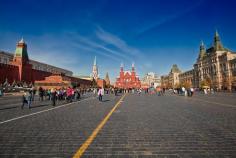 
                    
                        One end of Moscow's famous Red Square: Kremlin and Lenin's Tomb (left); State Historical Museum (center); and the enormous GUM Department Store (right).
                    
                