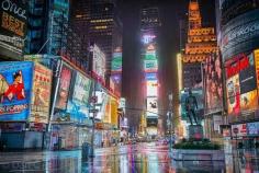 
                        
                            Times Square under the Rain by Dan Carr
                        
                    
