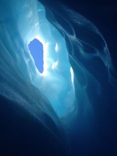 
                    
                        Looking up from inside the Blue Cave at Fox Glacier. You squeeze through a narrow pathway carved by water under the ice and the light in there is a brilliant blue Discovered by Jen AdventureSmith at Fox Glacier, New Zealand
                    
                