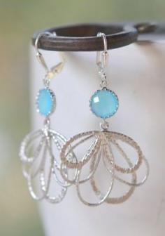 
                    
                        Sky Blue Dangle Earrings in Silver
                    
                