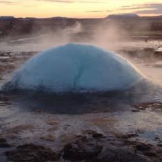 
                    
                        This isn't the big geysir...but a smaller one called Strokker. It goes off about every few minutes. Caught this bubble right before the pressure shot it up in the air! Discovered by Chris Billinger at Arnessysla, Iceland
                    
                