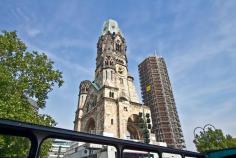 
                    
                        Kaiser Wilhelm Memorial Church in Berlin, badly damaged during a bombing raid in 1943, was left unrepaired as a reminder of the war.
                    
                