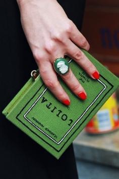 
                    
                        Book, Cameo Ring & Red Nails
                    
                