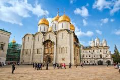 
                    
                        Dormition Cathedral, Patriarch's Palace, and Church of the Twelve Apostles, located in Cathedral Square, inside the grounds of the Kremlin in Moscow
                    
                