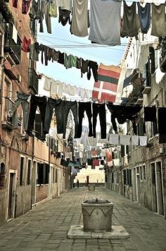 
                    
                        Laundry day in Castello, Venice.  Castello is the largest of the six sestieri of Venice, Italy. The district grew up from the thirteenth century around a naval dockyard on what was originally the Isole Gemini.
                    
                