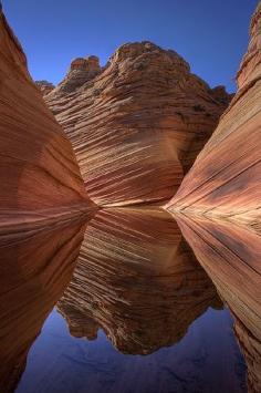 
                    
                        Paria Canyon on the border of Utah and Arizona. Hike in a slot canyon or register for a permit to visit The Wave.
                    
                